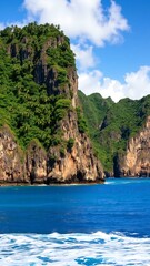 Tropical Island Coastline with Lush Cliffs and Azure Ocean 