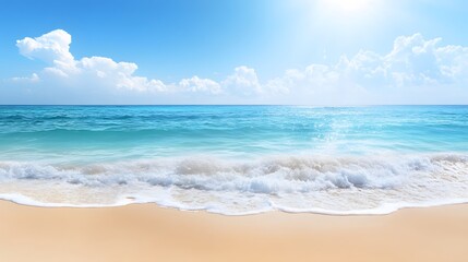 Tranquil beach scene with clear blue waters and gentle waves under a sunny sky