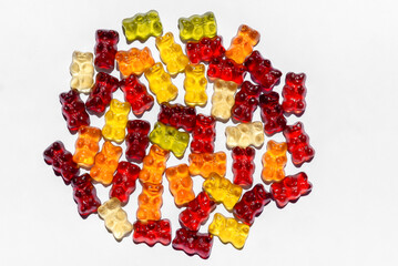 Colorful different Haribo gummy bears on white background
