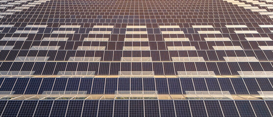 Greenhouse for growing vegetables with mounted photovoltaic solar panels on the roof, combining...