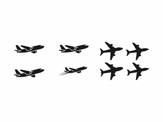 A collection of six black silhouette airplane icons, depicting various flight stages, including...