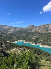 Fototapeta premium Stunning Aerial View of Mountain Valley and Turquoise River