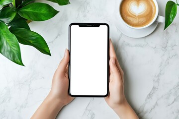 Hands Using Mock Up Smartphone on Worktable with Mock Up Tablet and Coffee Cup