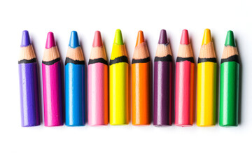 Ten vibrant crayons are neatly arranged in a straight line, showcasing a variety of colors perfect for artistic projects and children's crafts