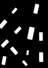 Abstract white shapes scattered against a black background  