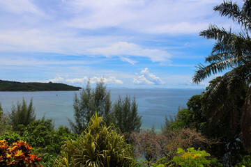 sea mountains blue sky green trees cloud