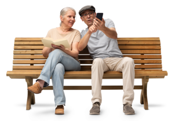 Mature couple sitting together on a wooden bench, woman reading a book and man using a smartphone. Studio image isolated on white background. Casual outfits, man wearing reading glasses and a hat