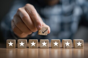 A hand placing a checkmark block on a line of starmarked blocks