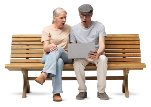 Surprised mature couple sitting on a wooden bench and looking at a laptop with astonished expressions. Both have their mouths open in shock. Studio shot isolated on white background. - Powered by Adobe