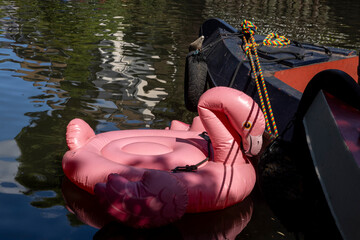 A Pink Inflatable Flamingo Floating in Regent's Canal.