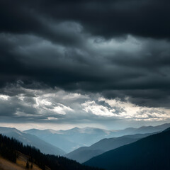 A mountain range with a cloudy sky