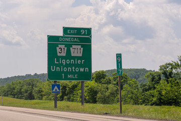 sign for Exit 91, Donegal Interchange, from the Pennsylvania Turnpike I-76 for PA-31 and PA-711 toward Ligonier and Uniontown