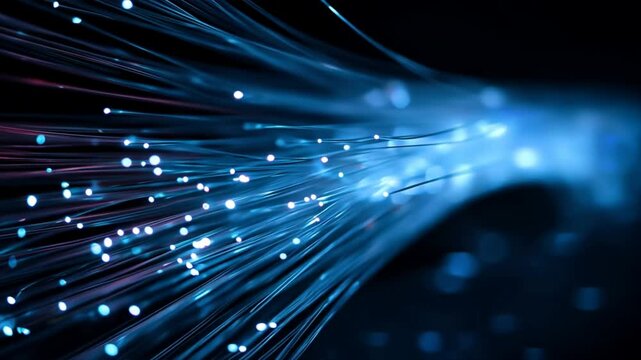 Fiber optic light beams flowing in motion on a dark blue background, representing digital connectivity and high speed data transfer in a tech network - Powered by Adobe