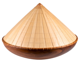 Traditional Vietnamese conical hat crafted from natural materials rests gently on a smooth wooden bowl