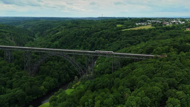 High Drone Flight Over Mungstener Brucke with Train in Solingen Germany