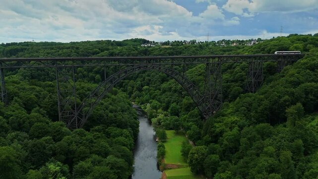 Wide Aerial View of Mungstener Brucke with Train Crossing in Germany