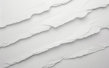Torn white paper pieces arranged diagonally on a white background Irregular edges and textures are visible