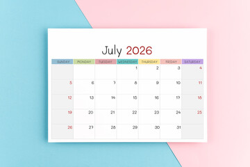 July 2026 calendar page on blue and pink color background.