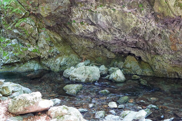 reservoir river current shore stones rocks water nature Bulgaria