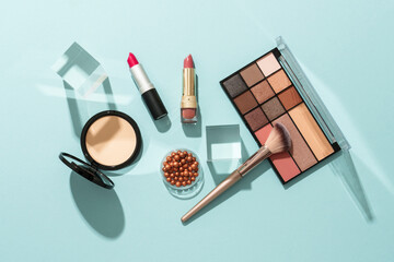 Beauty products on blue background.