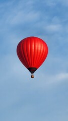 Colorful Hot Air Balloons flying over neighborhood