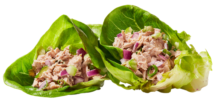 Two fresh tuna salad lettuce wraps with red onion and celery for a healthy lunch or light dinner Concept of diet, low carb, and clean eating