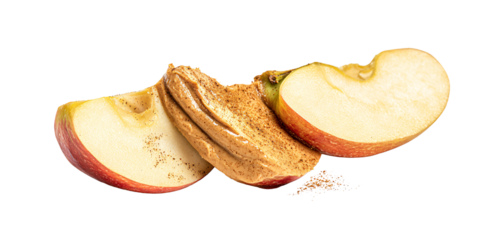 Sliced red apple with creamy peanut butter and cinnamon, a healthy snack for diet and nutrition Concept of healthy eating, balanced diet, and delicious snack