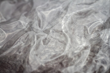 Extreme macro of plastic bubble wrap texture. Selective soft focus, shallow depth of field. Abstract dreamy background