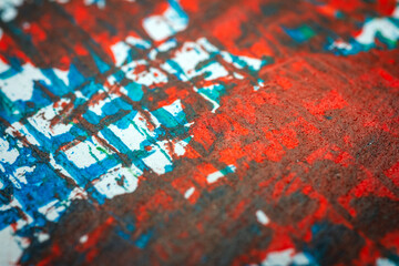 Extreme close up of colorful acrylic paint texture showing brush strokes. Selective focus.