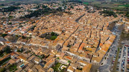 Aerial view of the old town of Pezenas in France on a sunny afternoon in spring.
