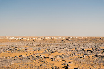 White rock formations and sand dunes in Egypt's White Desert, natural desert landscape	