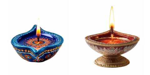 Two diya lamps illuminated against a black background for diwali celebration image