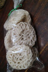 Uncooked Rice Crackers in Plastic Bag