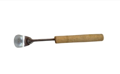 Close-up of an old garden trowel with a wooden handle and rusted metal blade isolated on white background.
