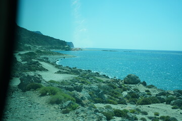 Coastal Landscape with Rocky Beachline and Calm Sea