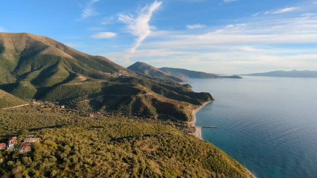Powered paragliding paramotor flying over Albanian coast mountains and beaches aerial panorama landscape view,Albania,Balcan