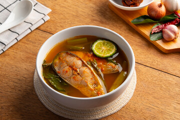 Chak sohm sour curry (gaaeng chak sohm),Thai Sour soup made of Tamarind Paste with striped catfish...