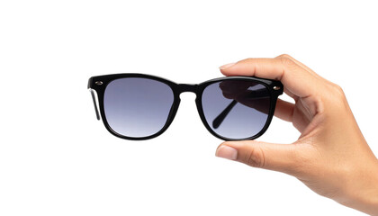 Black sunglasses with gradient lenses held by hand with natural skin tone