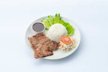 Roast Pork and Rice On a white plate