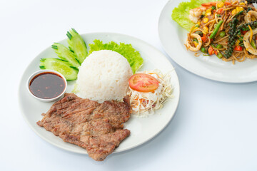 Roast Pork and Rice On a white plate