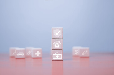 Insurance and safety protection concept. Stack wooden blocks and display the insurance icon on the wooden blocks. healthcare, insurance, investment, Car Insurance, travel, health family insurance