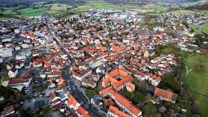 Aerial view around the city Schlüchtern, 36381 in Germany on a sunny spring day