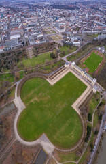 Aerial view of the downtown around the city Kassel in Hessen, Germany on a cloudy day. in autumn	
