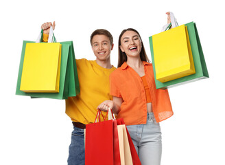 Happy couple with shopping bags on white background