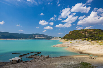 Yesa reservoir showing low water level during drought in Sigues, Spain