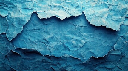 Fototapeta premium Rippling waves of textured blue paper create a vibrant visual landscape