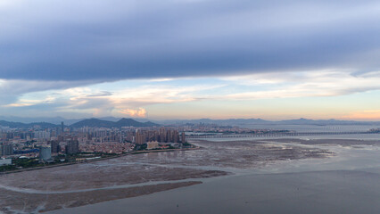 China Xiamen A Harmonious View of City and Nature with a Majestic Skyline and Serene Waters