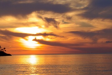 Dramatic orange sunset over the sea