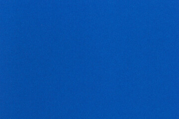 Solid blue paper texture with soft grain surface, ideal for creative backgrounds, graphic design,...