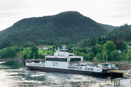 Regular ferry crossing the Songfjord between Lavik and Oppedal in Western Norway, operated by Norled Shipping, moored in the port of Lavik with a mountainous landscape in the background
